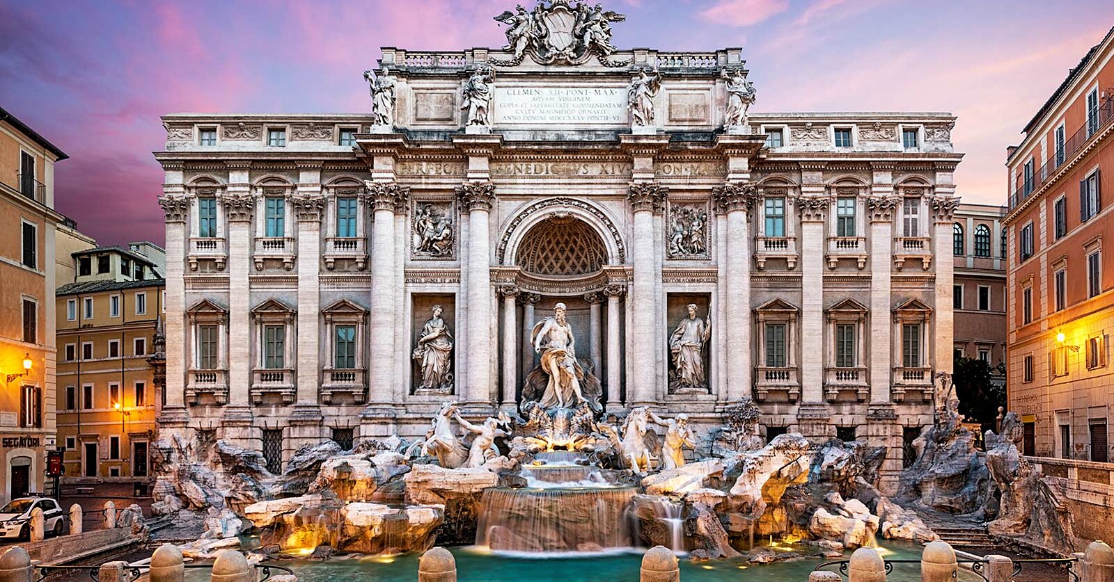 The Trevi Fountain (note the blocked window on the right of the second floor) - Rome, Italy