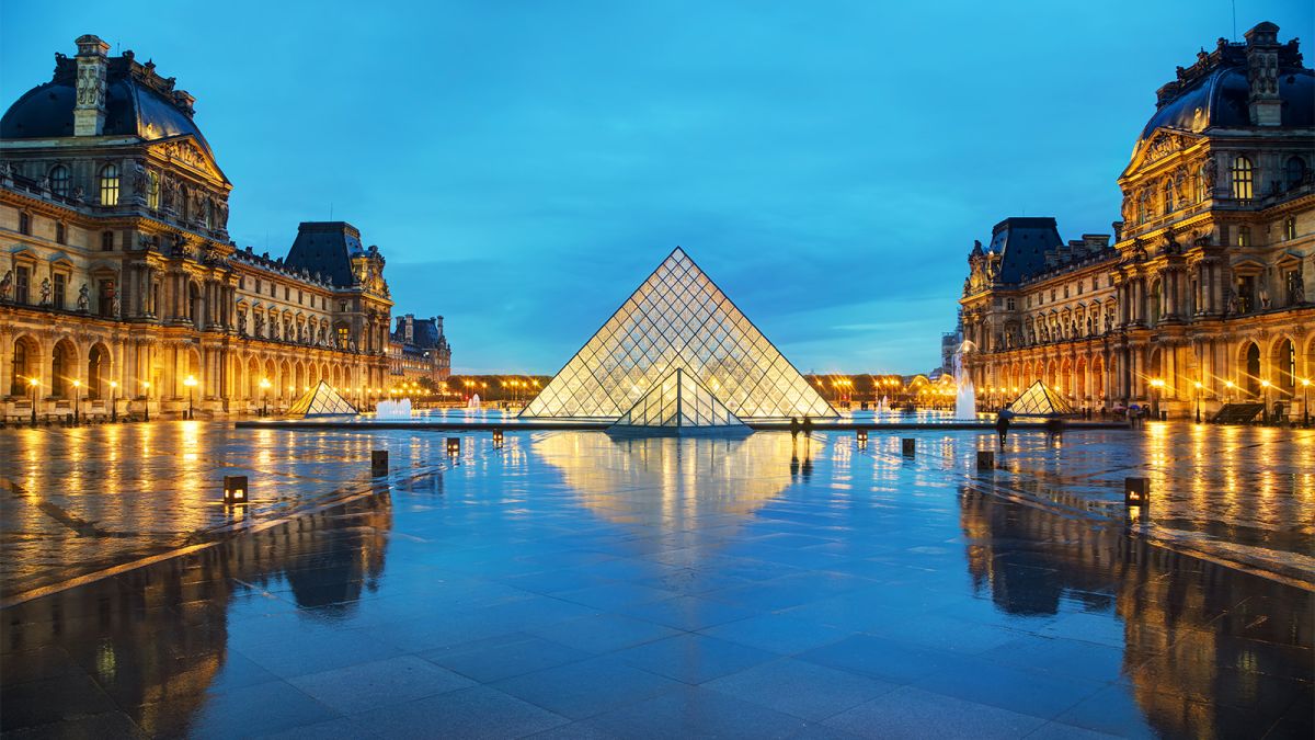 Place Napoleon (and glass pyramid) at the Musée du Louvre - Paros, France